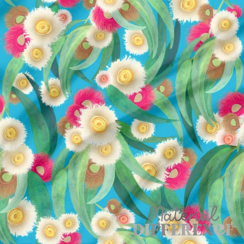 Colorful floral pattern with green leaves on a blue background