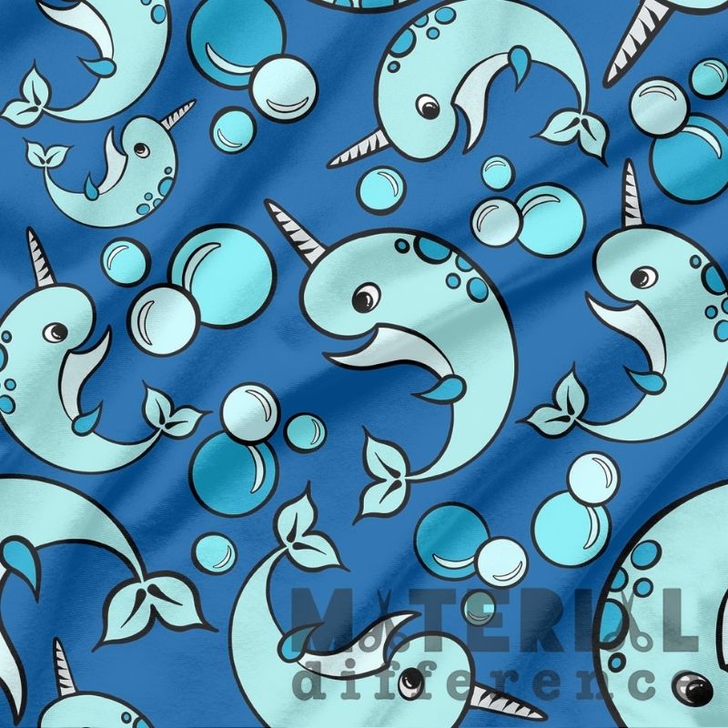 Pattern of blue narwhals and bubbles on a blue background with 'Material Difference' branding.