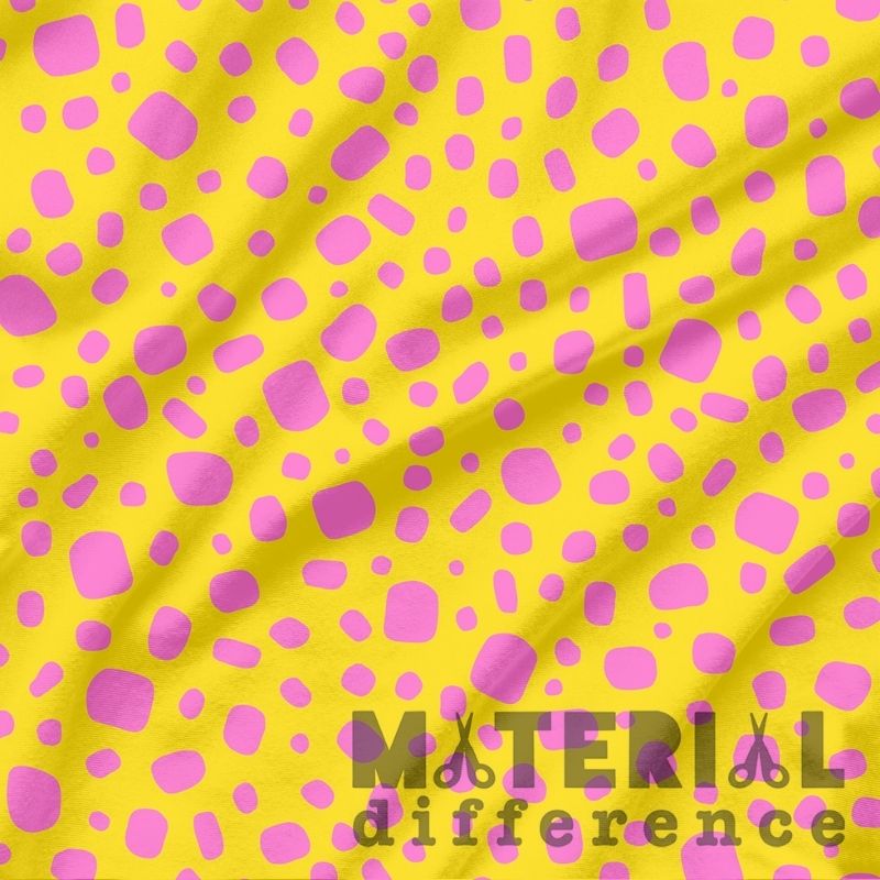 Yellow fabric with pink polka dots and 'Material Difference' branding.
