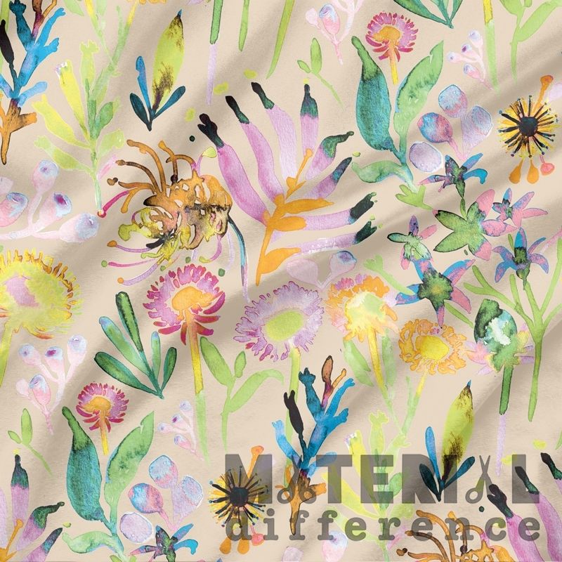 Colorful floral pattern on fabric with 'Materia Difference' branding.