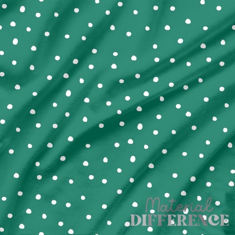 Green fabric with white polka dots and 'Material Difference' branding.