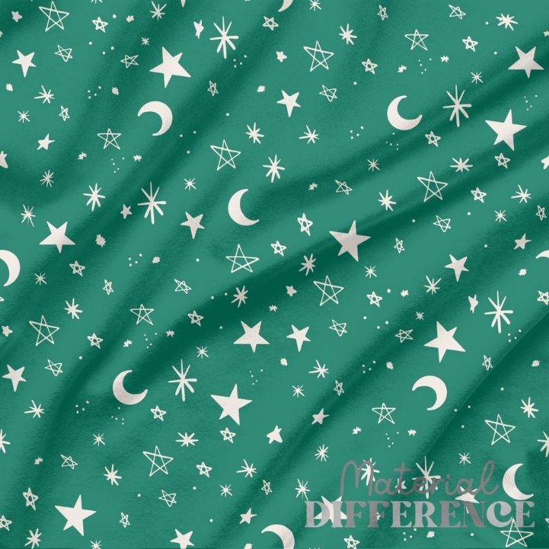 Green fabric with white star and moon pattern, 'Material Difference' brand visible.