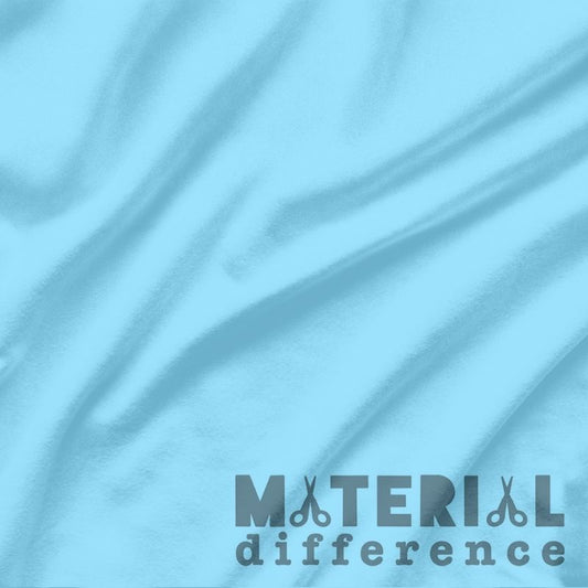 Light blue fabric texture with 'Material Difference' logo.