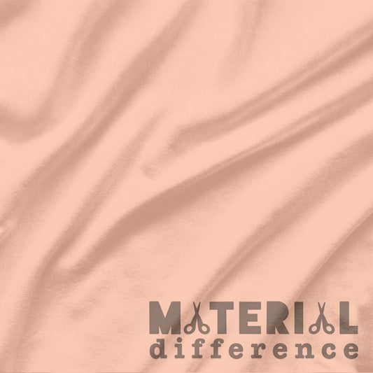Peach fabric with 'Material Difference' logo