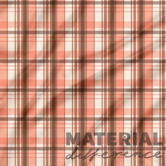Red and cream Plaid pattern with text 'MATERIAL difference' on a fabric background