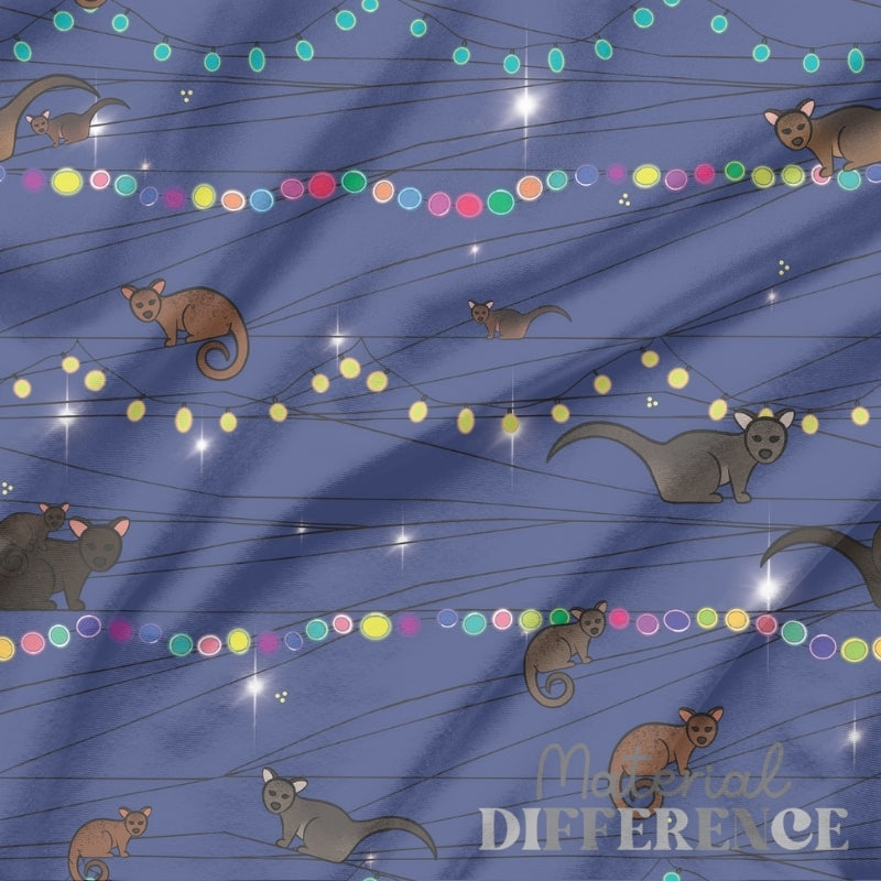 Pattern of possums and colorful lights on a blue background with 'Material Difference' text.