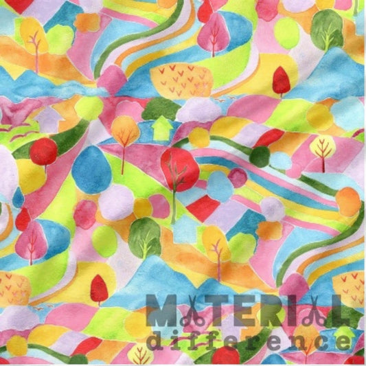 Colorful fabric pattern with trees and abstract shapes, featuring the brand 'Material Difference'.