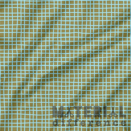 Textured green fabric with a grid pattern and 'Material difference' branding.