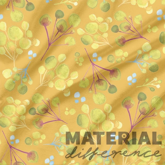 Fabric with floral pattern and 'Material Difference' text on a yellow background
