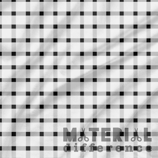 Black and white checkered fabric with 'Material Difference' text overlay