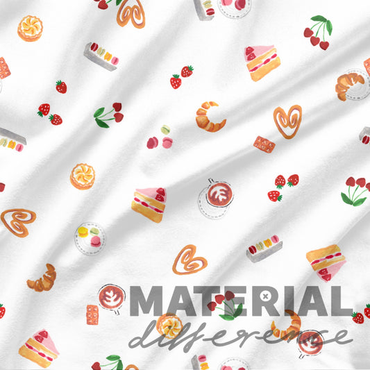 Fabric with colorful food pattern and 'Material Difference' text on a white background