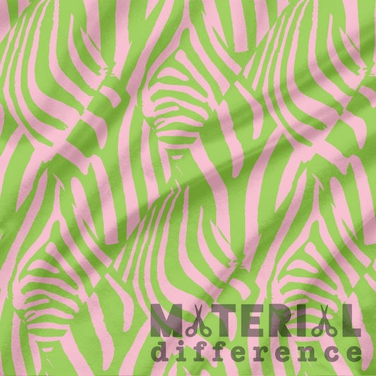 Fabric with pink and green zebra pattern and 'Material Difference' branding.