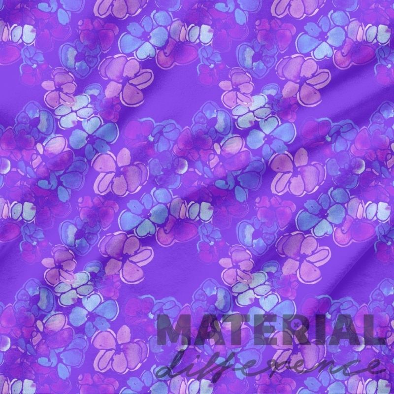 Floral patterned fabric with 'MATERIAL Difference difference' text on a purple background