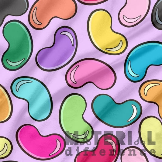 Colorful jelly beans on a purple background with 'Material Difference' text.