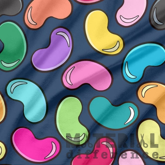 Colorful jelly bean pattern on a blue fabric background with 'Made for the difference' text.