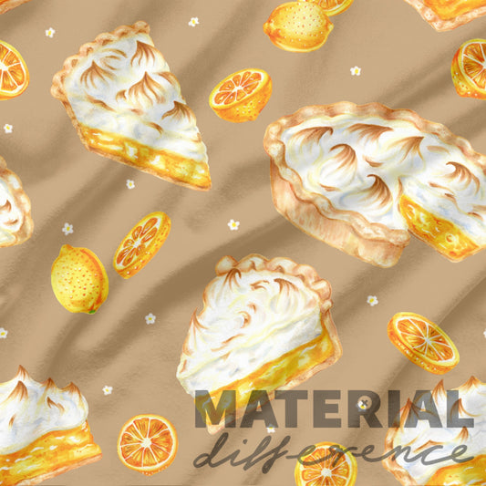 Pattern of lemon meringue pies and lemon slices on a beige background with 'MATERIAL difference' text.