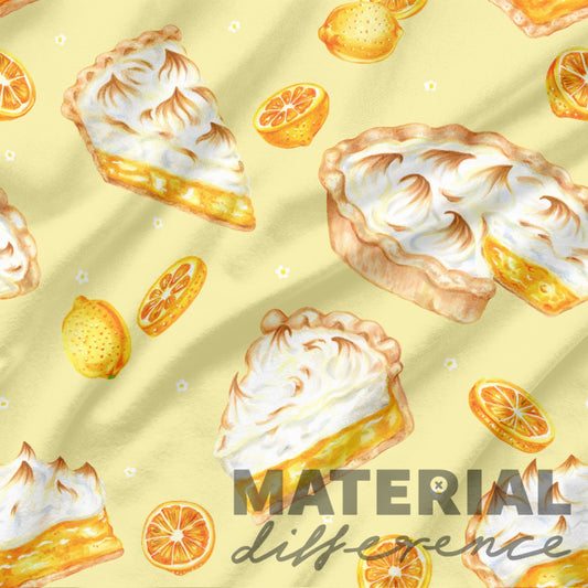 Pattern of lemon meringue pies and lemon slices on a yellow background with 'MATERIAL difference' text.