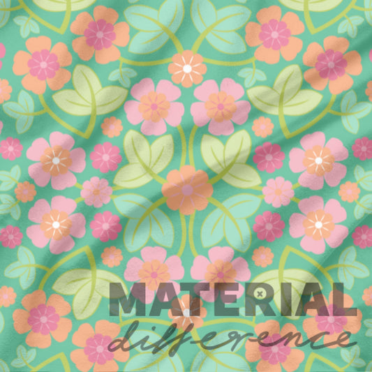 Pink and orange Floral pattern with 'Material Difference' text on a green background