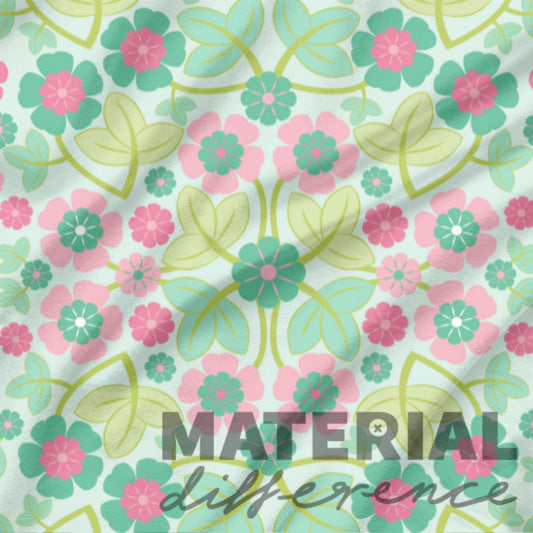 Floral patterned material with 'MATERIAL difference' text on a mint green background