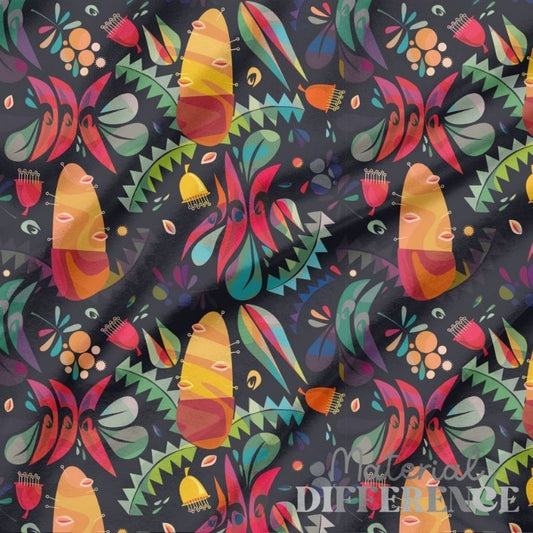 Colorful patterned fabric with 'Material Difference' branding on a dark background