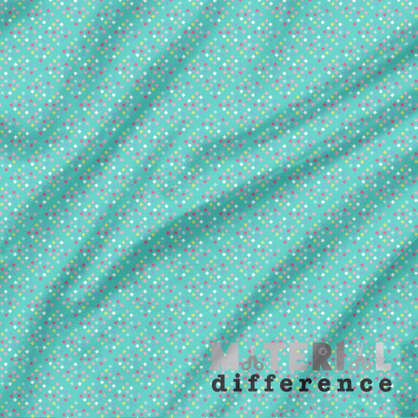 Fabric with small multicolored small diamonds on an aqua background, featuring the brand 'Material Difference'.