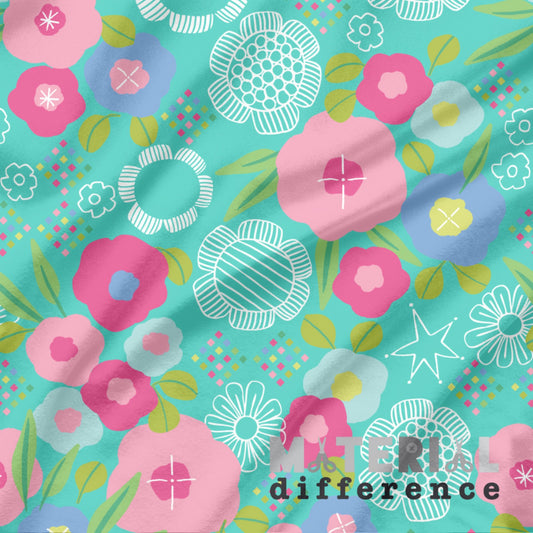 Colorful floral pattern with 'Material Difference' branding on an aqua background