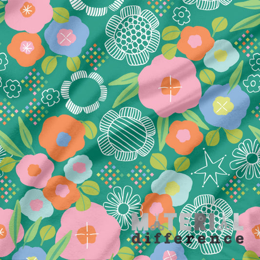 Colorful floral pattern with 'Make a Difference' text on a green background