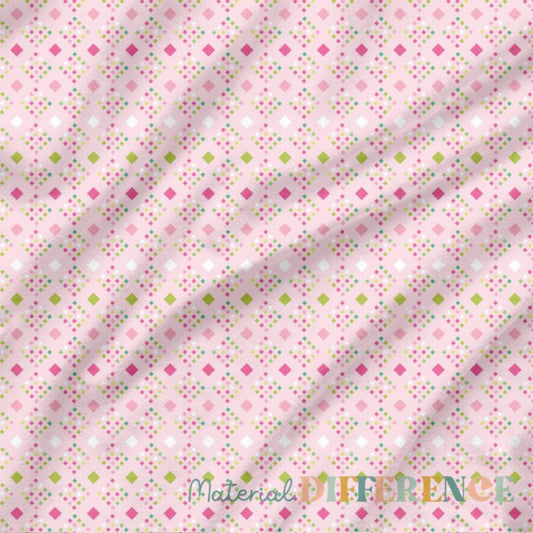 Fabric with colorful square pattern on a pink background, featuring 'Material Difference' branding.