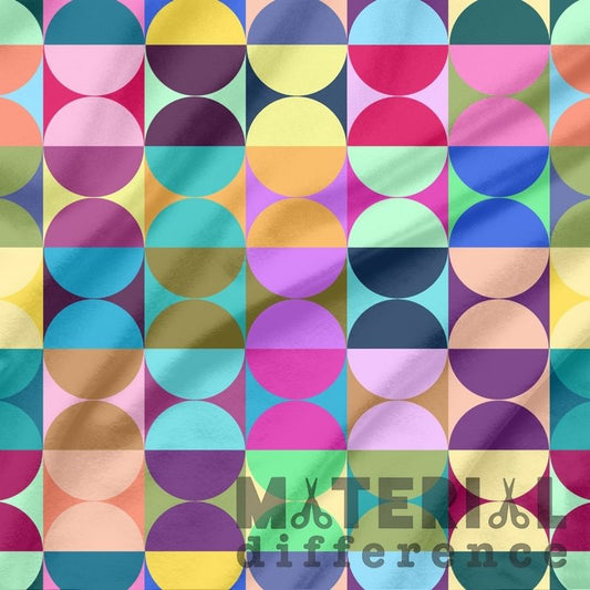 Colorful geometric pattern with circles and squares, featuring the text 'Material Difference'.