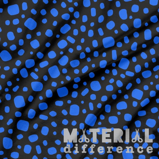 Black fabric with blue abstract pattern and 'Material Difference' branding.