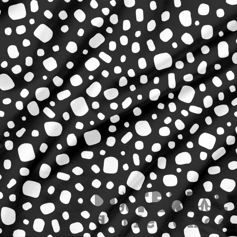 Black fabric with white abstract pattern