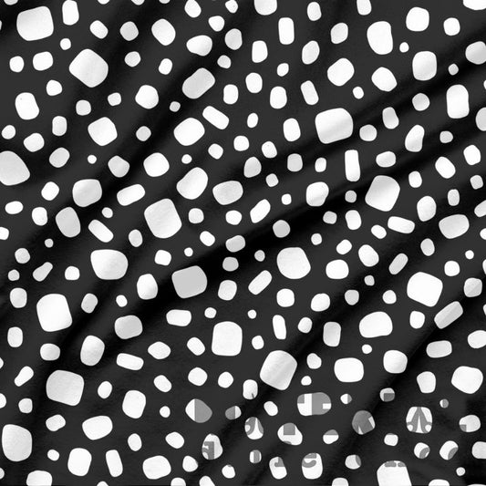 Black fabric with white abstract pattern