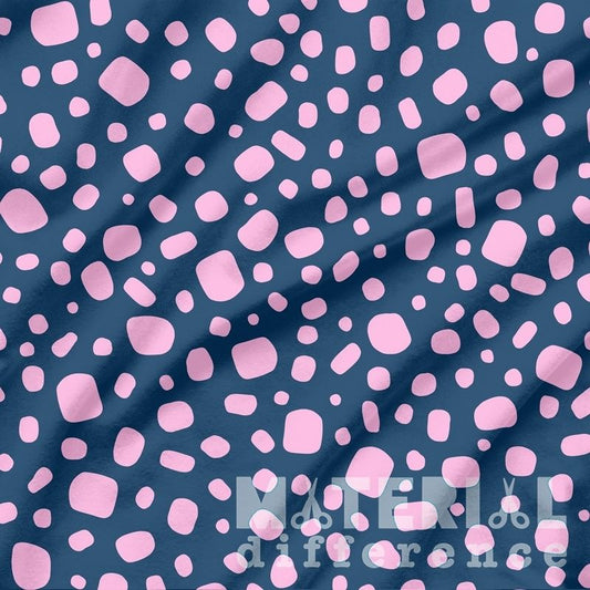 Navy blue fabric with pink polka dots and 'Natures Difference' branding.