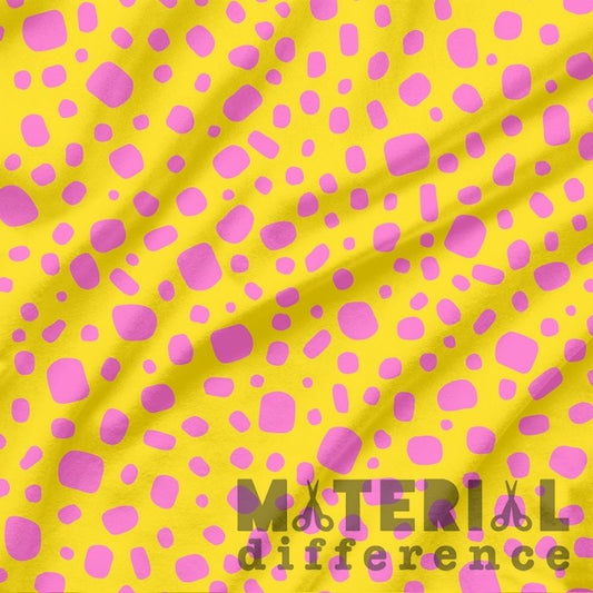 Yellow fabric with pink polka dots and 'Material Difference' branding.