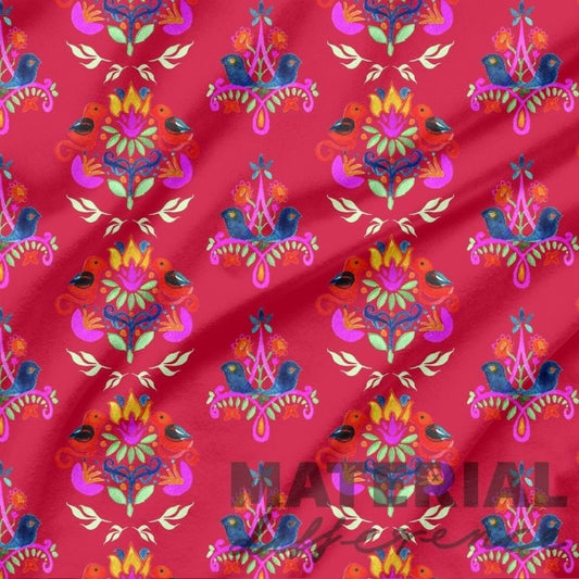 Colorful floral and bird pattern on red fabric with 'MATERIAL Difference' branding.