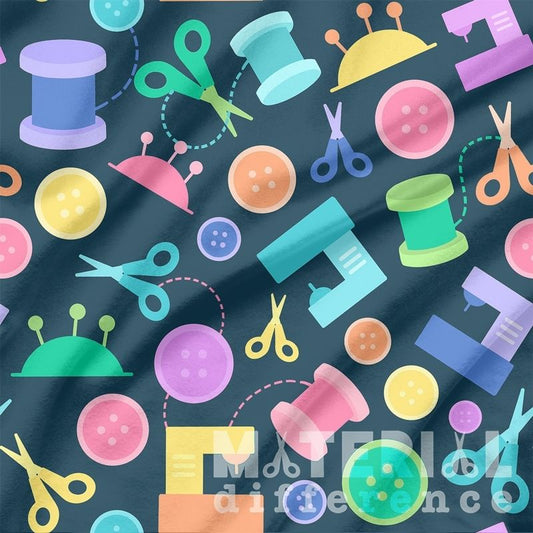 Colorful pattern of sewing-related items on a dark fabric background