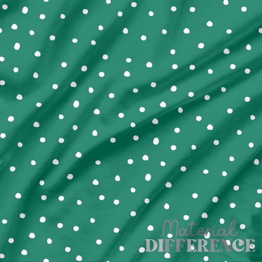 Green fabric with white polka dots and 'Material Difference' branding.