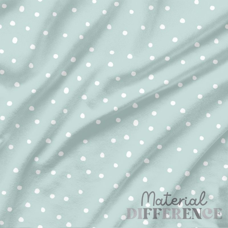 Light blue fabric with white polka dots and 'Material Difference' branding.