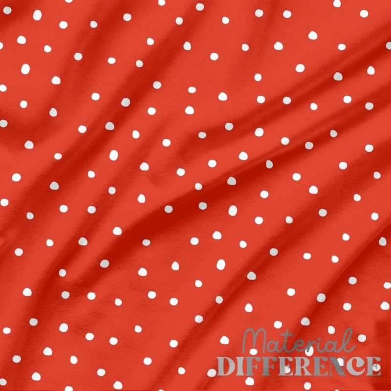 Red fabric with white polka dots and 'Material Difference' text.