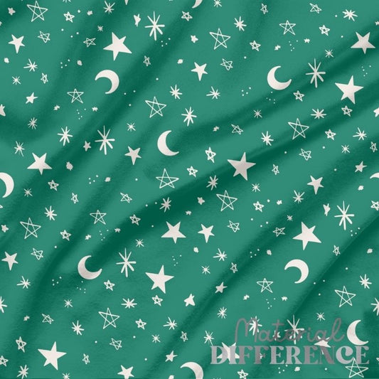 Green fabric with white star and moon pattern, 'Material Difference' brand visible.