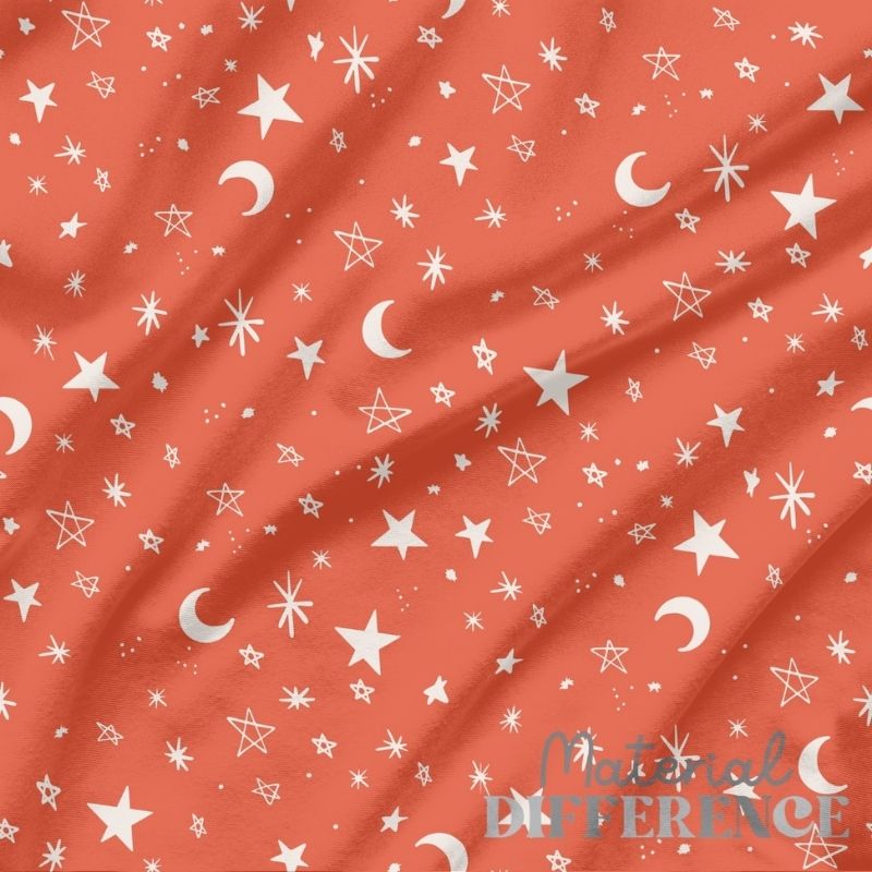 Red fabric with white star and moon pattern, 'Material Difference' branding visible.