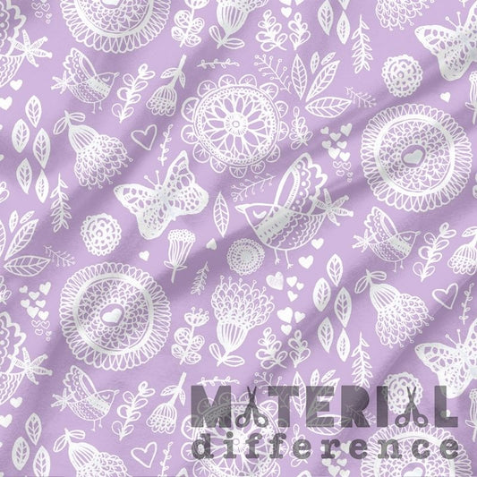 White floral and butterfly pattern on a purple background with 'Material Difference' text.