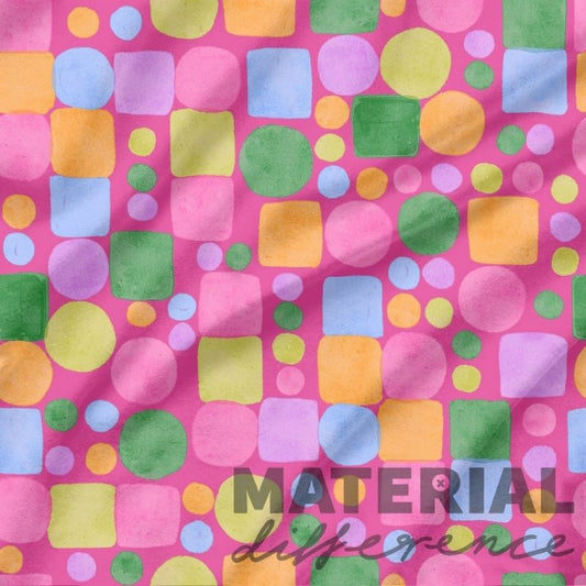 Colorful patterned material with 'MATERIAL difference' text on a pink background